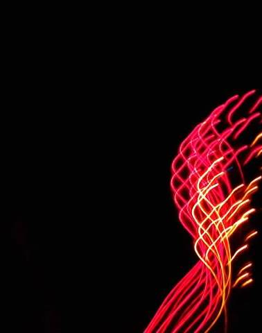 Firescapes abstract light trails in red and gold on black